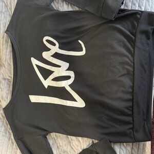 Black long sleeve off the shoulder top with Silver Love Graphic